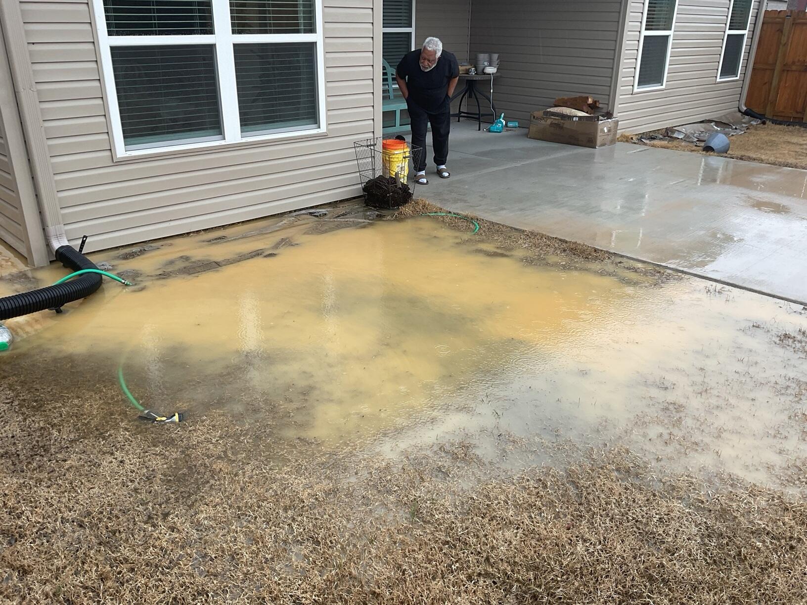 Water pooling around house