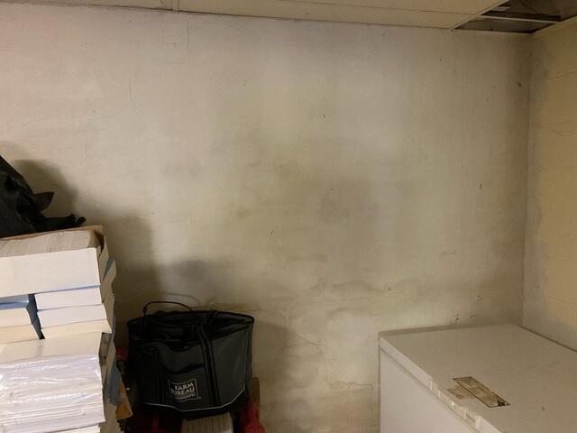 Cracked Basement Wall Stabilized with CarbonArmor and BrightWall in Mantachie, MS