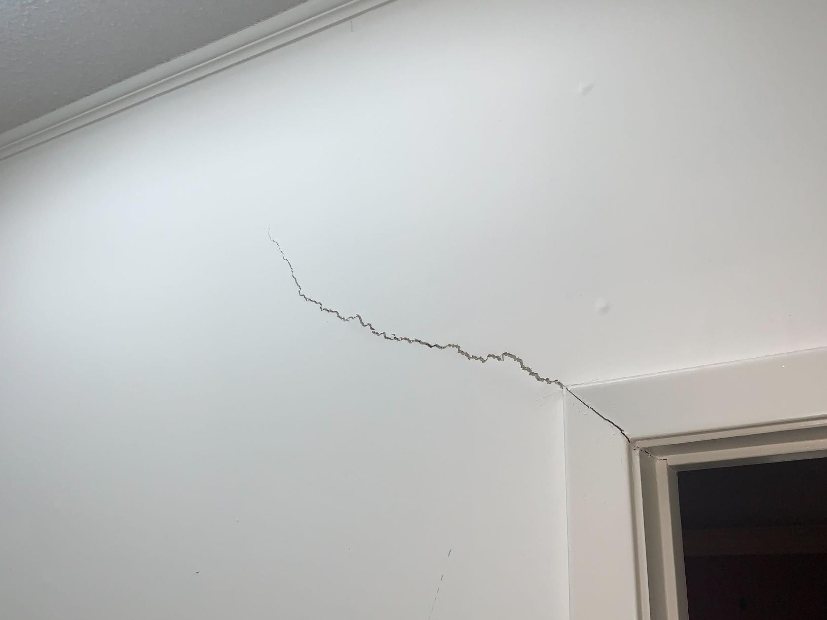 White residue on basement walls
