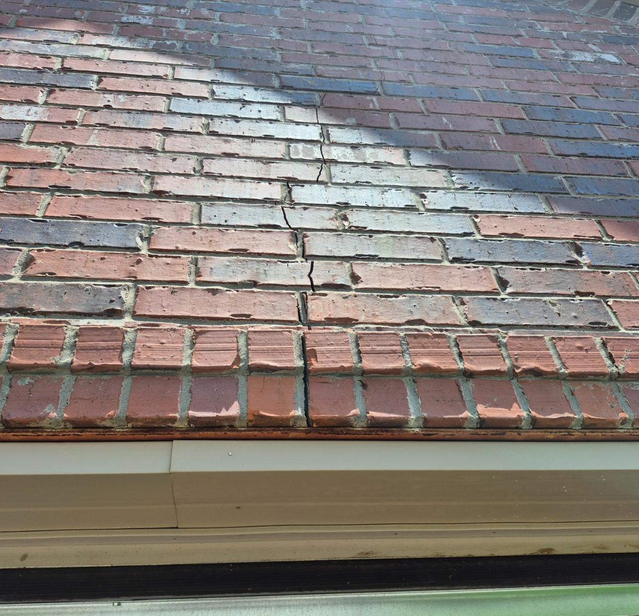 Cracks above garage door